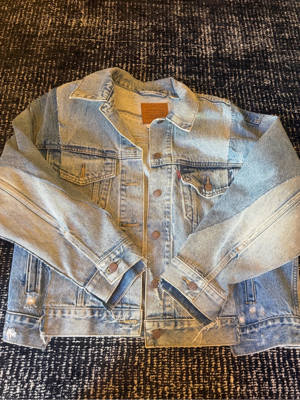 Levi Light Wash Denim Jacket with Distressed Hem